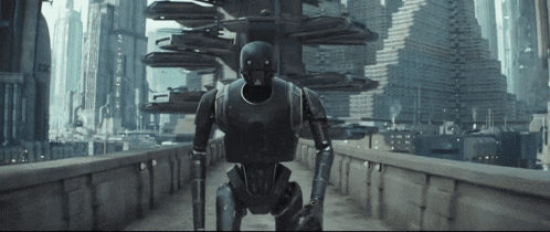 a robot is walking across a bridge in front of a futuristic city