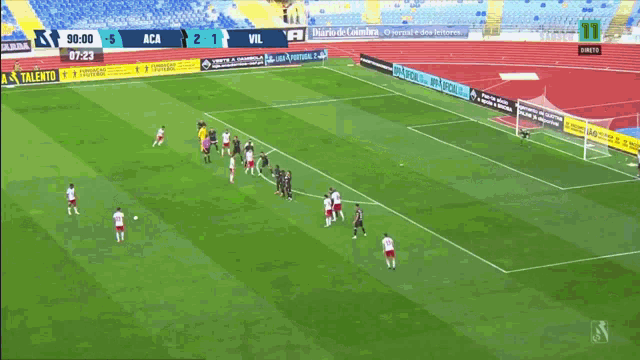 a soccer player wearing a number 23 jersey celebrates a goal