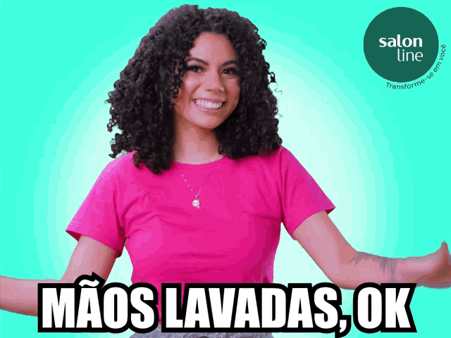 a woman with curly hair wearing a pink shirt with salon line written on the bottom right