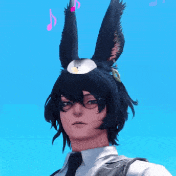 a man is wearing a hat with bunny ears and a penguin on top of it .