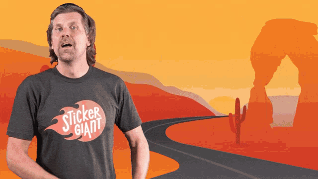 a man is wearing a sticker giant shirt