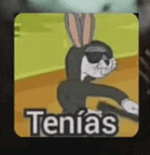 a cartoon of bugs bunny wearing sunglasses and the words tenia 's on it .