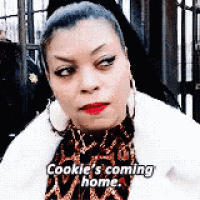 a woman is wearing a fur coat and earrings and saying `` cookie 's coming home . ''