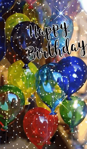 a bunch of balloons with the words `` happy birthday '' on them .