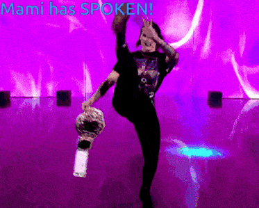 a purple background with a person holding a trophy and the words mami has spoken