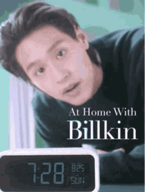 a poster for at home with billkin shows a man laying down