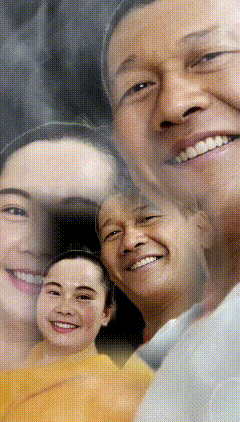 a group of people are smiling for the camera