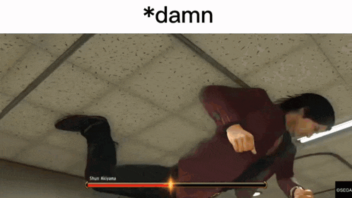 a man is laying on his stomach in a video game with the words * damn * above him