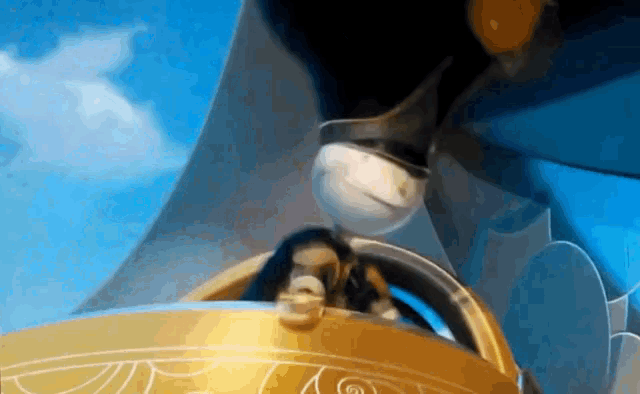 a cartoon character is driving a car with a blue sky behind him