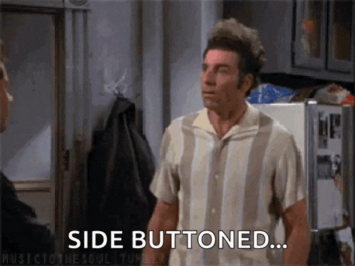 a man in a striped shirt is standing in front of a refrigerator with the words `` side buttoned '' written on it .