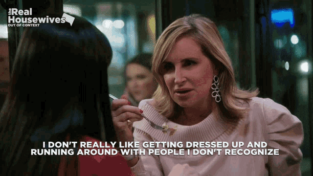 a real housewives advertisement shows two women talking to each other