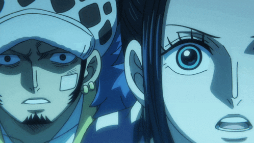 a man and a woman looking at each other with their eyes wide open