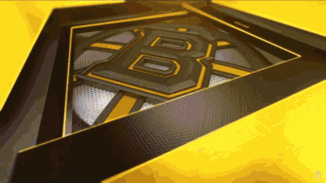 a yellow background with the letter b in the middle