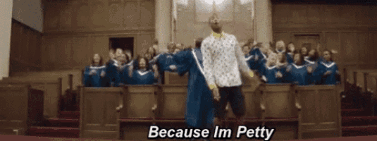 a man and woman are dancing in front of a choir in a church with the words because im petty written on the bottom
