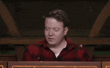 a man in a red plaid shirt says " with which i cannot disagree "