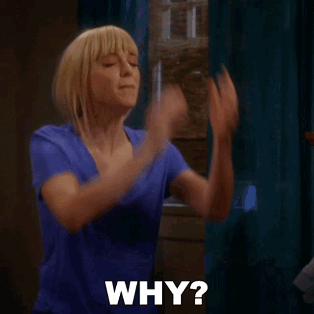 a woman in a blue shirt is clapping her hands and says " why "