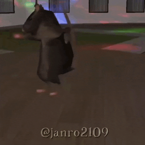 a couple of mice are dancing in a room with a green light .