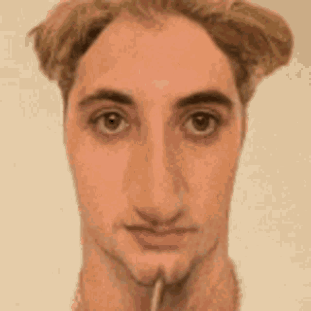 a close up of a man 's face with a long neck and a pencil in his mouth .