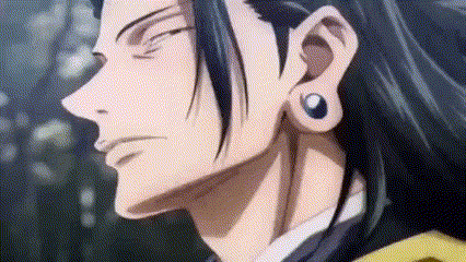 a close up of a person 's ear with a pair of earrings on it .