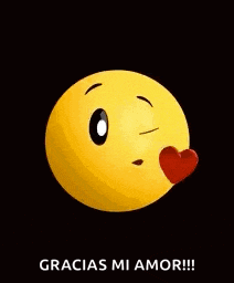 a yellow smiley face with a red heart in front of it and the words `` gracias mi amor '' .