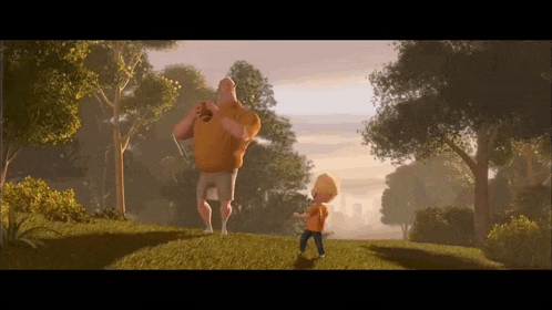 a man and a boy are standing on a grassy hillside