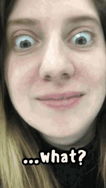 a close up of a woman 's face with the words what written below her