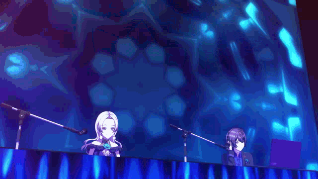 a couple of people sitting in front of microphones with a colorful background