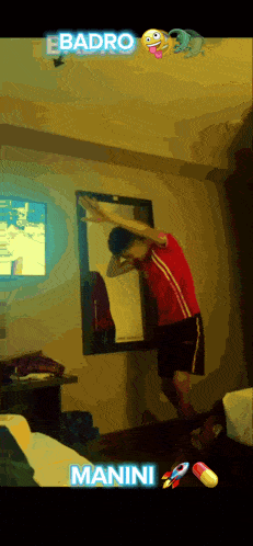 a man in a red shirt is doing a dab in front of a mirror with the name manini on the bottom right
