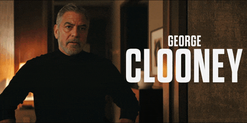 a movie poster for george clooney features a man in a black shirt