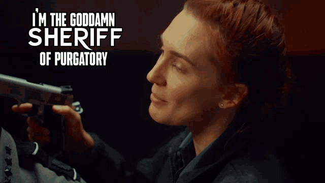 a woman holding a gun with the words " i 'm the goddamn sheriff of purgatory " behind her
