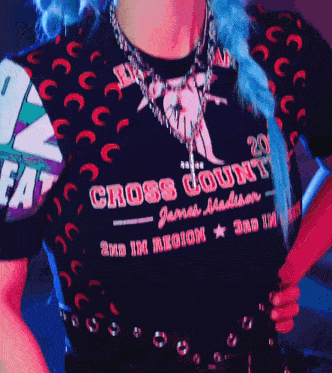 a woman with blue hair is wearing a black shirt that says cross count on it