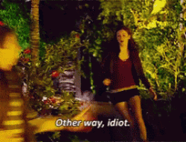 a woman says " other way idiot " while walking