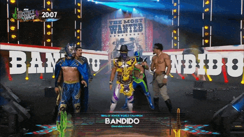 a group of wrestlers are standing in front of a wanted poster