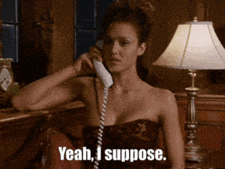 a woman talking on a phone with the words yeah i suppose above her