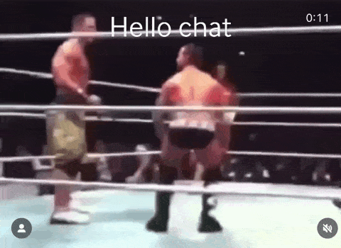 a video of two men in a boxing ring with the words hello chat at the bottom