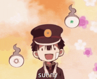 a boy in a hat is standing in front of a bunch of flowers and ghosts .