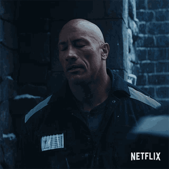 a man with his eyes closed and a netflix logo on the bottom