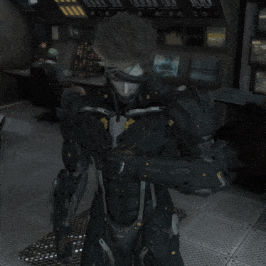 a man in a futuristic suit is holding a gun in a room