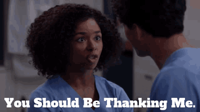 a man and a woman are looking at each other with the words " you should be thanking me " below them