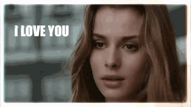 a close up of a woman 's face with the words `` i love you '' written in the corner .