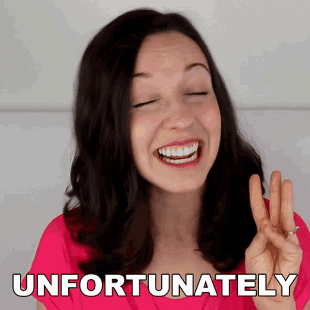 a woman in a pink shirt is smiling and making a peace sign in front of the word unfortunately