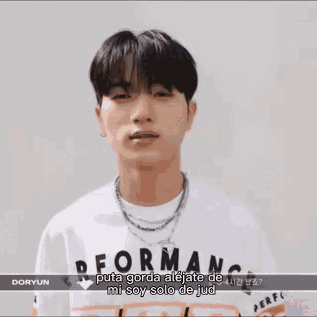 a young man wearing a t-shirt that says doryun
