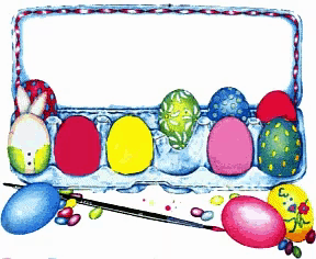 a box of painted easter eggs with a brush and some candy