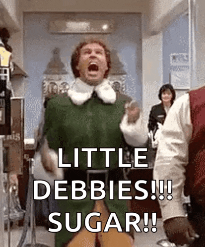 a man in a green vest is screaming in a room with the words `` little debbies !!! sugar ! ''