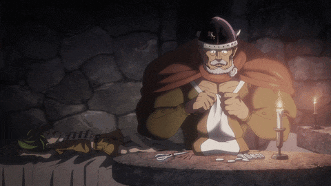a cartoon of a man sitting at a table with scissors and a candle
