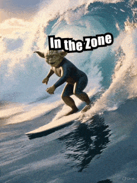 a picture of yoda riding a wave with the words in the zone