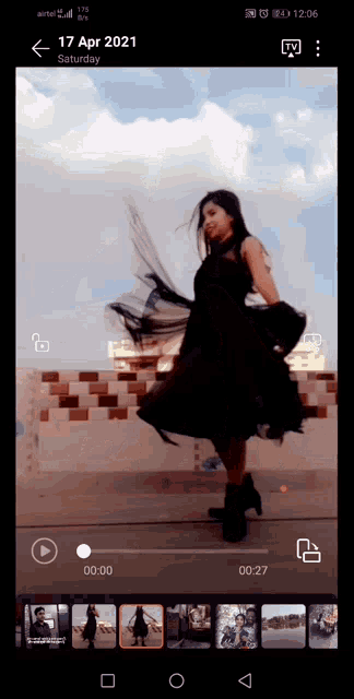 a phone screen shows a video of a woman dancing on saturday 17 april 2021