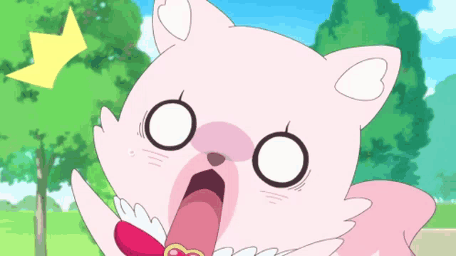a pink cat with a surprised look on his face