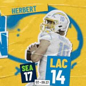 a football player named herbert is holding a ball