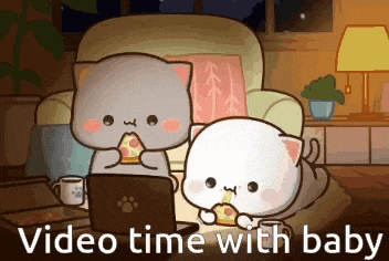 two cats are sitting on a couch eating pizza and watching a video .